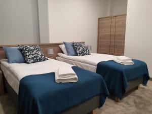 Postel nebo postele na pokoji v ubytování Hotel Garbów *** Centrum Konferencyjno - Bankietowe
