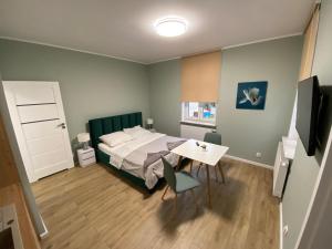 Postel nebo postele na pokoji v ubytování Apartament Kleopatra