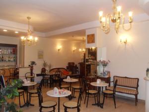 Restaurant ou autre lieu de restauration dans l'établissement Hotel Ferrara
