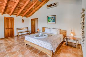 Postel nebo postele na pokoji v ubytování Casa Sueños