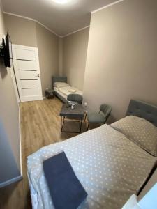Postel nebo postele na pokoji v ubytování Apartament Kleopatra