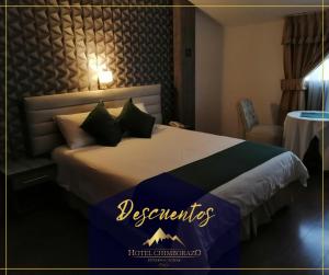 Postel nebo postele na pokoji v ubytování Hotel Chimborazo Internacional