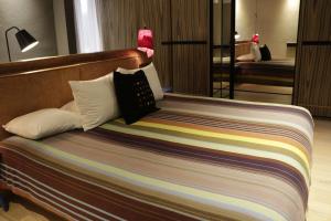 Postel nebo postele na pokoji v ubytování Hotel Bo