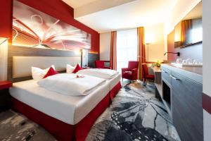 Ένα ή περισσότερα κρεβάτια σε δωμάτιο στο Best Western Premier Hotel Villa Stokkum