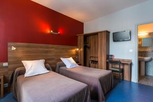 Tempat tidur dalam kamar di Hotel Barnetche