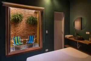Postel nebo postele na pokoji v ubytování Ô de Casa Hostel + 37 fotografií