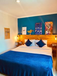 Postel nebo postele na pokoji v ubytování BH Baan Paradise Hotel Patong