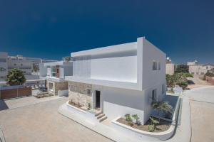 a rendering of a white house on a roof at Kube Luxury Villas in Ayia Napa