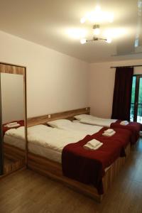 Postel nebo postele na pokoji v ubytování Paramount Kazbegi