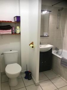 Ванная комната в La Plage Dorée