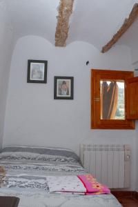 Postel nebo postele na pokoji v ubytování Rural puebla de san miguel