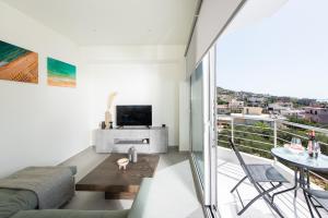 A television and/or entertainment centre at Analogy chania apartment