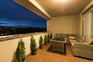 Et opholdsområde på Anastasia Mountain Apartment - Poiana Brasov