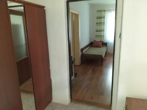 A bed or beds in a room at Turistická ubytovňa Chalupa Runina 8