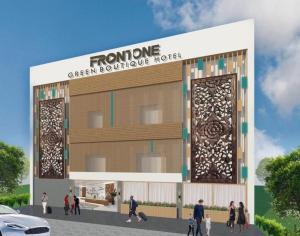 a rendering of the front of a green boutique hotel at Front One Green Boutique Hotel Abepura in Abepura