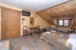 Postel nebo postele na pokoji v ubytování Hotel Gran Trun