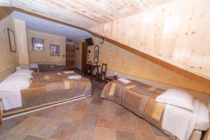 Postel nebo postele na pokoji v ubytování Hotel Gran Trun