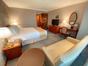 Gulta vai gultas numurā naktsmītnē Evergreen Laurel Hotel - Keelung