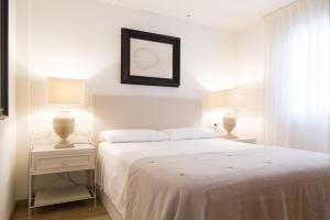 Postel nebo postele na pokoji v ubytování Apartamento Mestizo - Nogalera