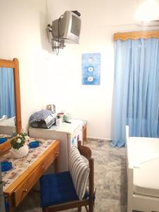 Postel nebo postele na pokoji v ubytování Massouri Rooms