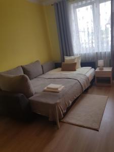 מיטה או מיטות בחדר ב-Luksusowy Apartament Lubień Kujawski