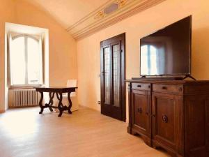 TV a/nebo společenská místnost v ubytování Mavitur Rooms Assisi