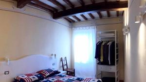 Postel nebo postele na pokoji v ubytování Mavitur Rooms Assisi