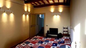 Postel nebo postele na pokoji v ubytování Mavitur Rooms Assisi