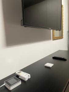 TV a/nebo společenská místnost v ubytování Hurban House
