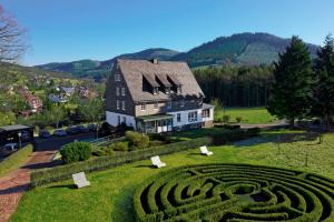 a house on a hill with a maze at St. Bonifatius in Winterberg