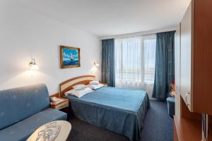 Postel nebo postele na pokoji v ubytování Hotel Sirena Saturn All Inclusive