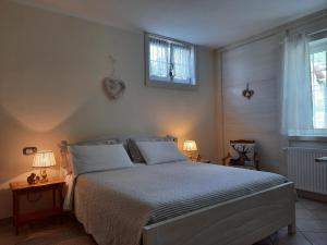 Cama o camas de una habitación en B&B Il Grappolo