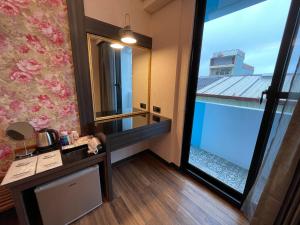 La alberca dentro o cerca de Weifeng Boutique Business Hotel - Zhanqian Branch