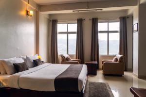Postel nebo postele na pokoji v ubytování Hotel Ariel