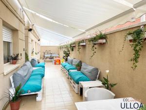 Posezení v ubytování CoLiving Ulloa