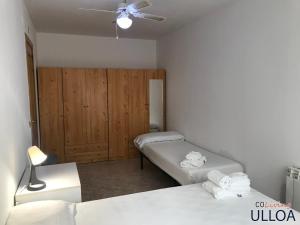 Postel nebo postele na pokoji v ubytování CoLiving Ulloa