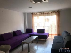 Posezení v ubytování CoLiving Ulloa