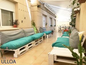 Posezení v ubytování CoLiving Ulloa