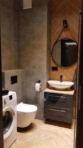 Kúpeľňa v ubytovaní Apartament Zamkowy