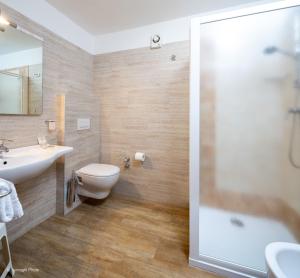 Koupelna v ubytování Hotel Alpen