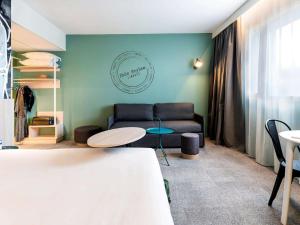 Postel nebo postele na pokoji v ubytování ibis Styles Limoges Centre