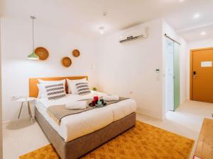 a bedroom with a large bed in a room at ibis Styles Golden Sands Roomer Hotel in Golden Sands