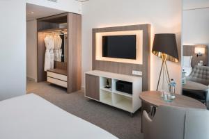 Cama ou camas em um quarto em Meliá Frankfurt City