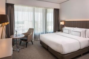 Cama ou camas em um quarto em Meliá Frankfurt City