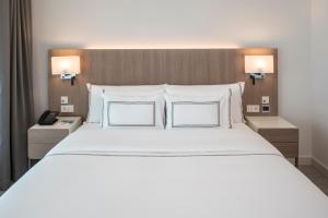 Cama ou camas em um quarto em Meliá Frankfurt City