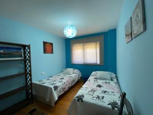 Postel nebo postele na pokoji v ubytování Altavista Apartment