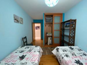 Posteľ alebo postele v izbe v ubytovaní Altavista Apartment