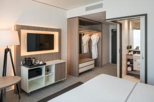 Cama ou camas em um quarto em Meliá Frankfurt City