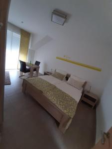 Postel nebo postele na pokoji v ubytování Casa la vino
