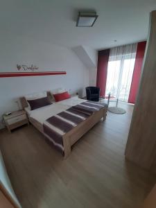 Postel nebo postele na pokoji v ubytování Casa la vino